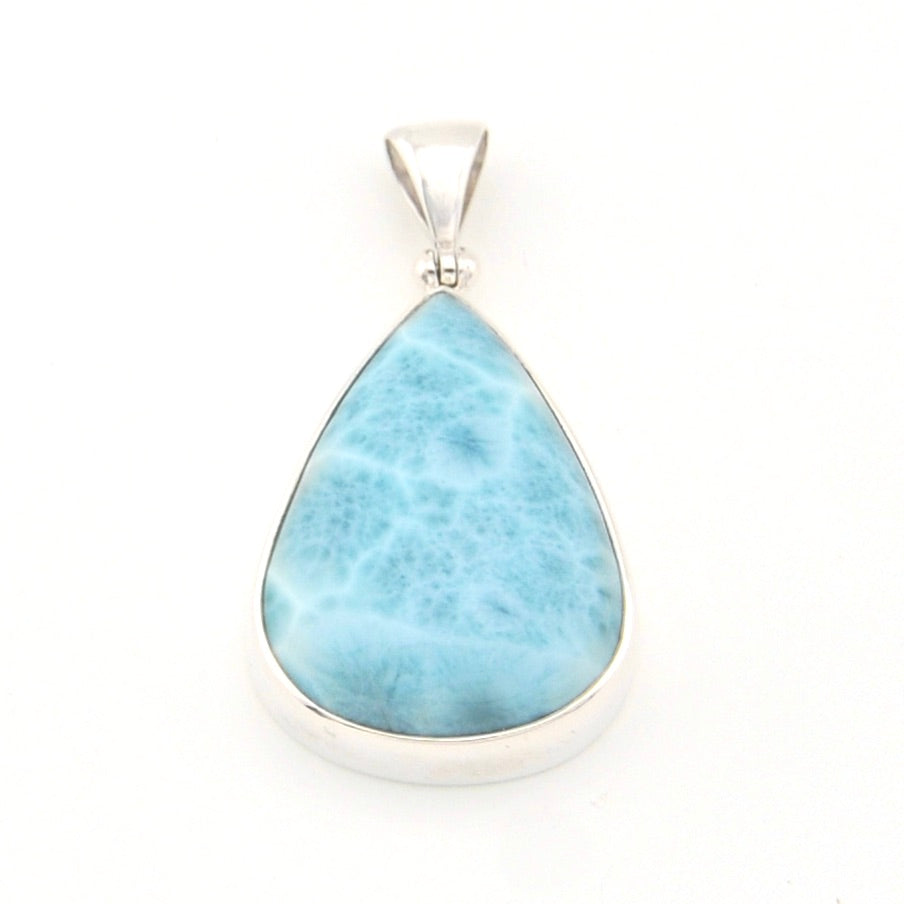 Teardrop-shaped larimar pendant on a white background