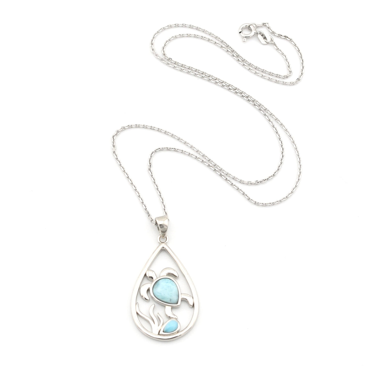 Sea Turtle Pendant with larimar on white background.