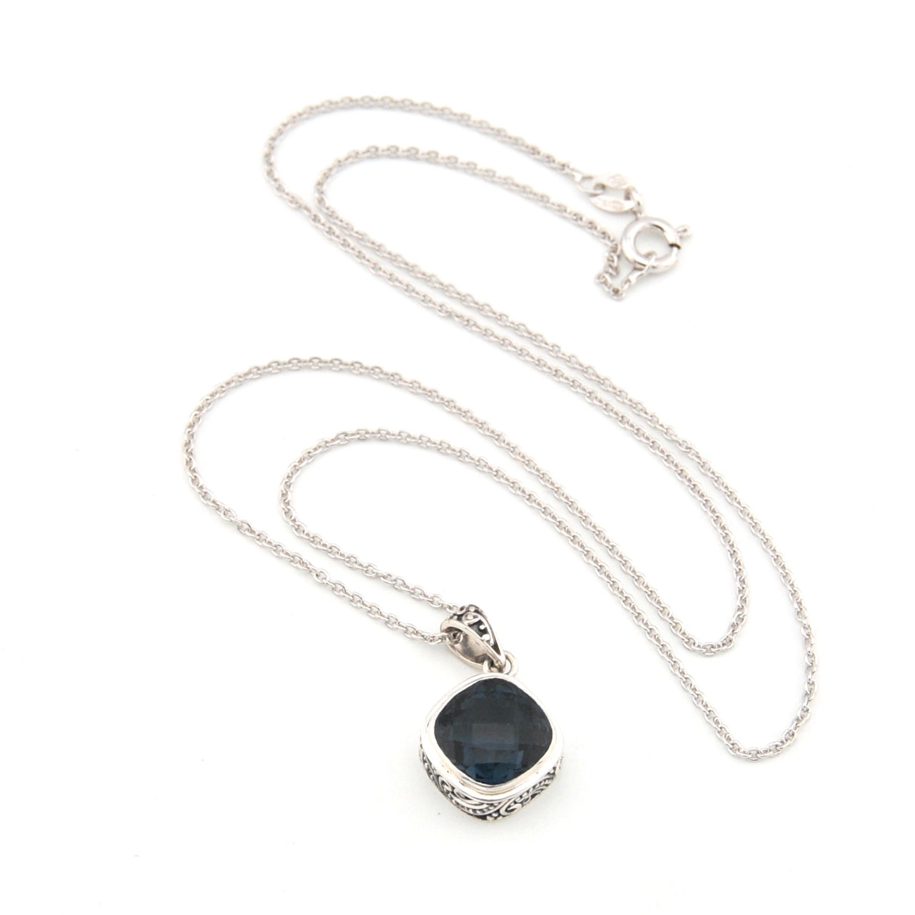Necklace with a blue pendant on a white background