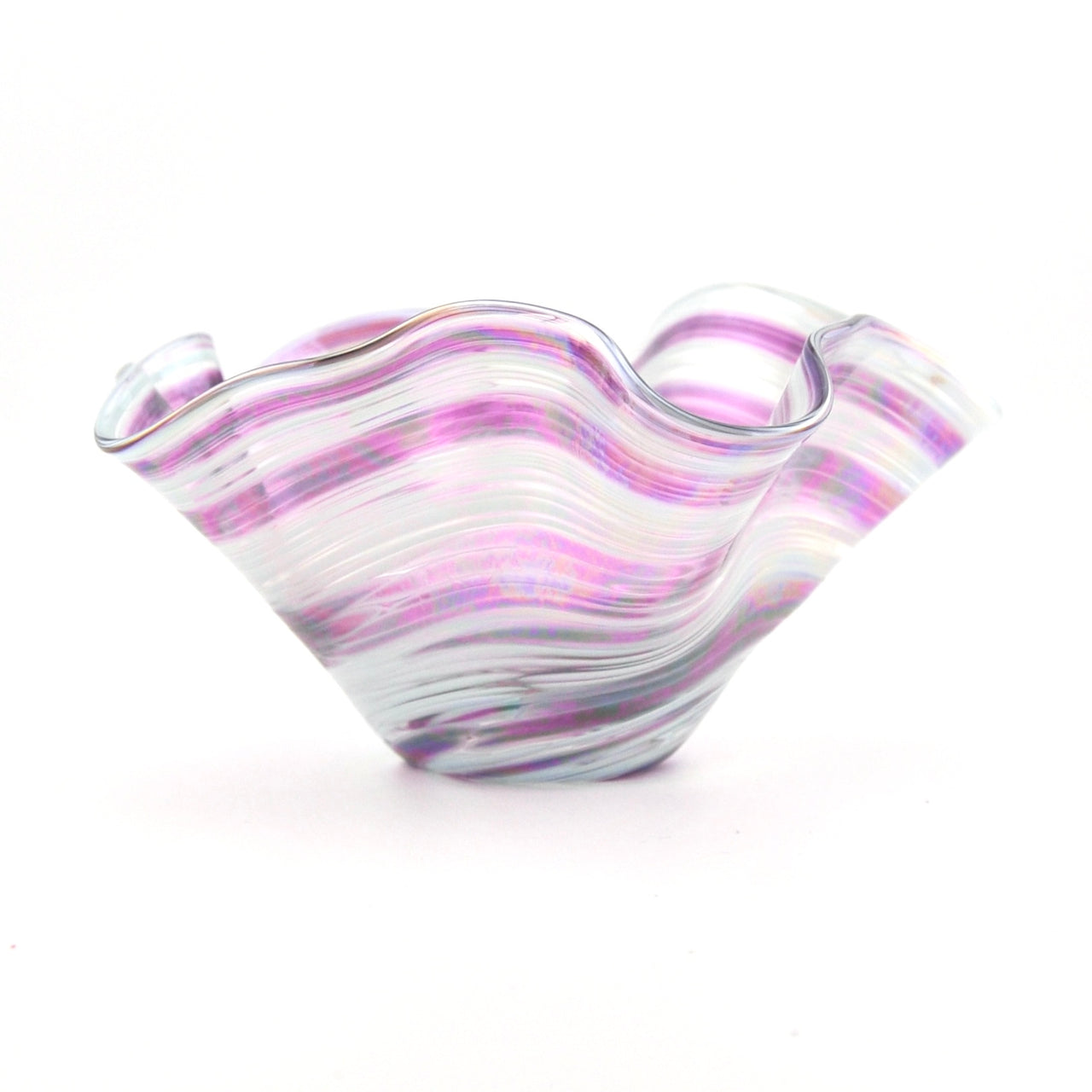 Glass bowl with purple and white swirl pattern on a white background