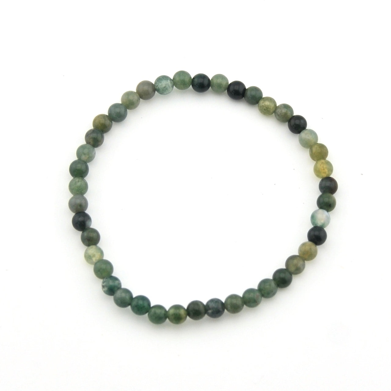 Round beaded bracelet with green and black stones on a white background