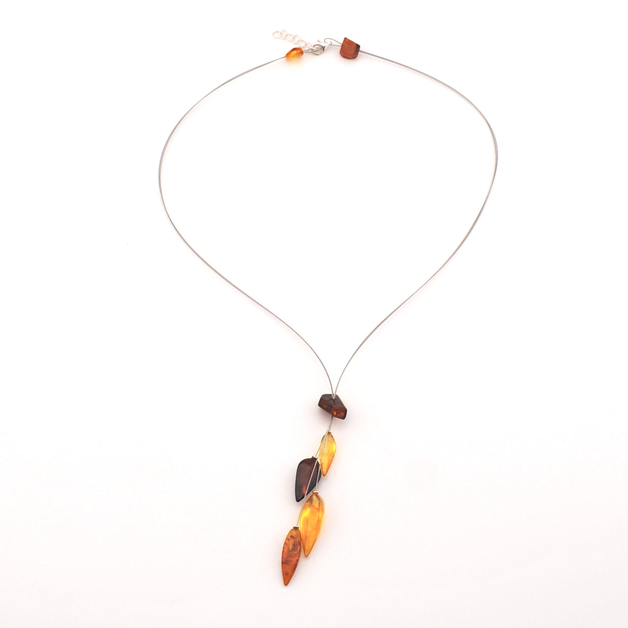 Necklace with amber-colored beads on a white background