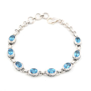 Over Head View Blue Topaz Oval Bali Link Bracelet
