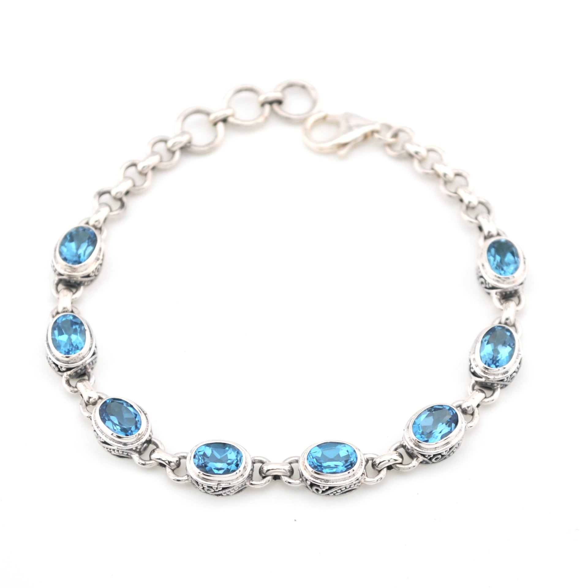 Over Head View Blue Topaz Oval Bali Link Bracelet