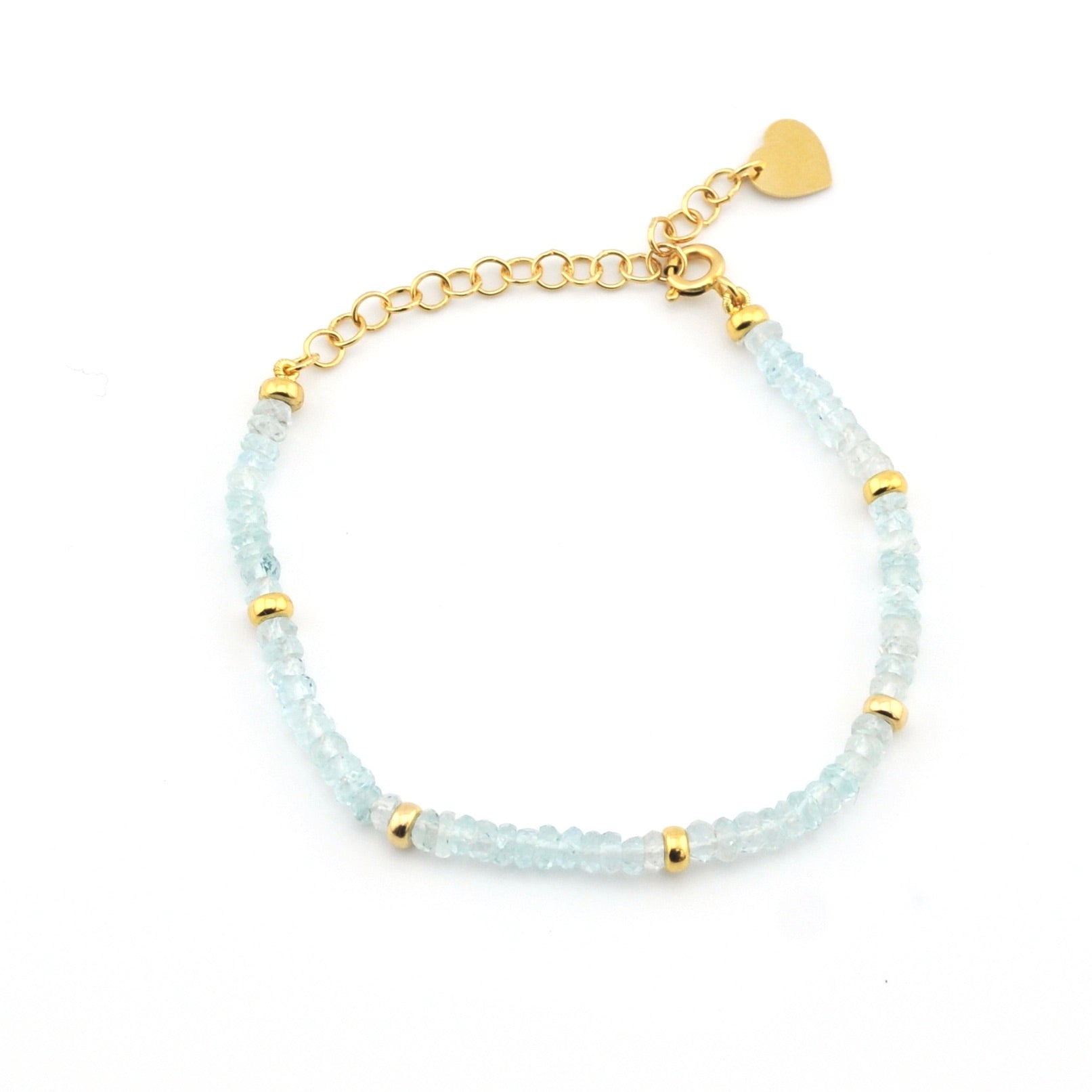 Bracelet with light blue beads and gold accents on a white background
