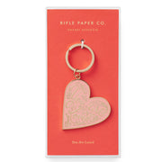Heart-shaped keychain on a Rifle Paper Co. branded card with 'You Are Loved' text.