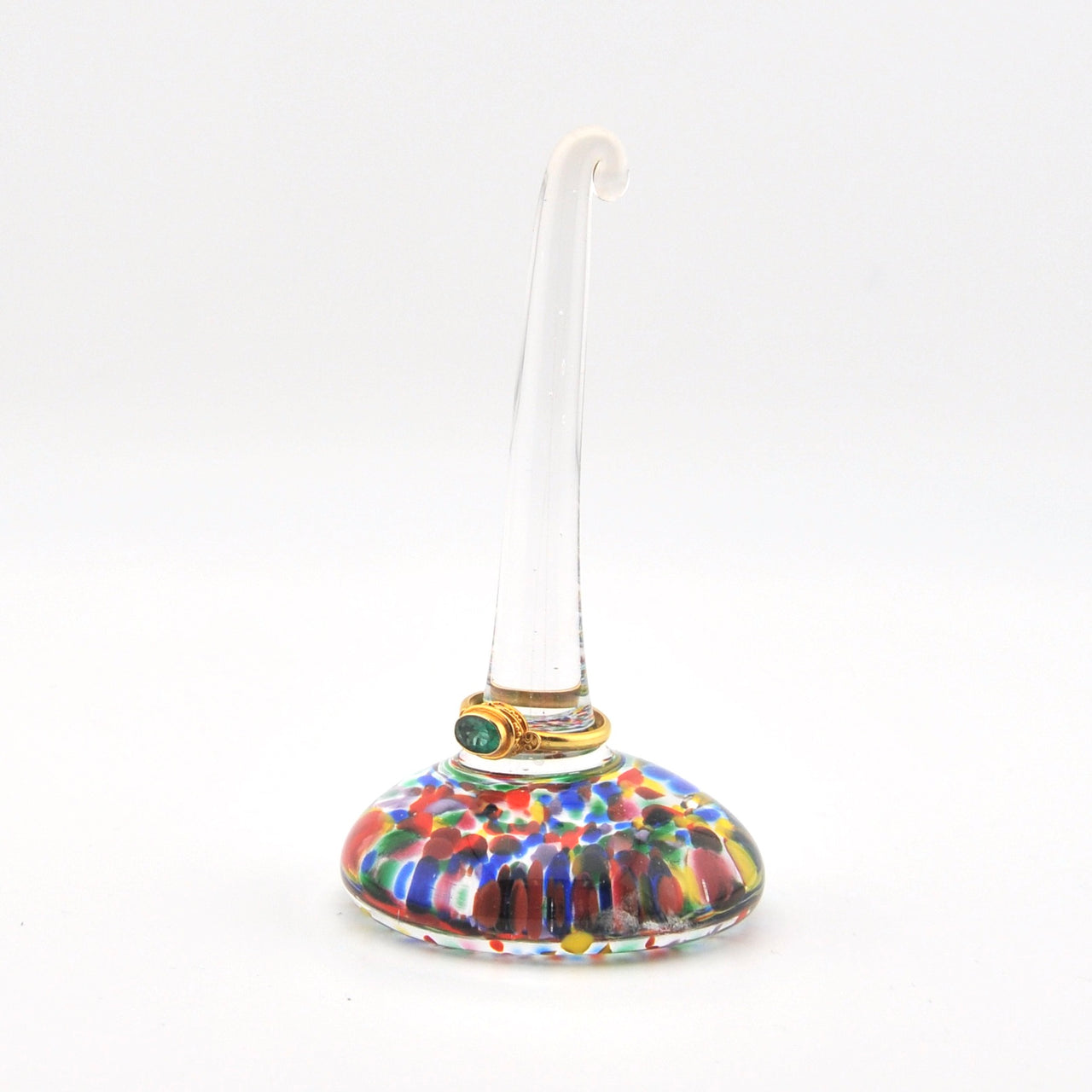 Multicolored glass ring holder on a white background