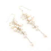 Pearl earrings on a white background