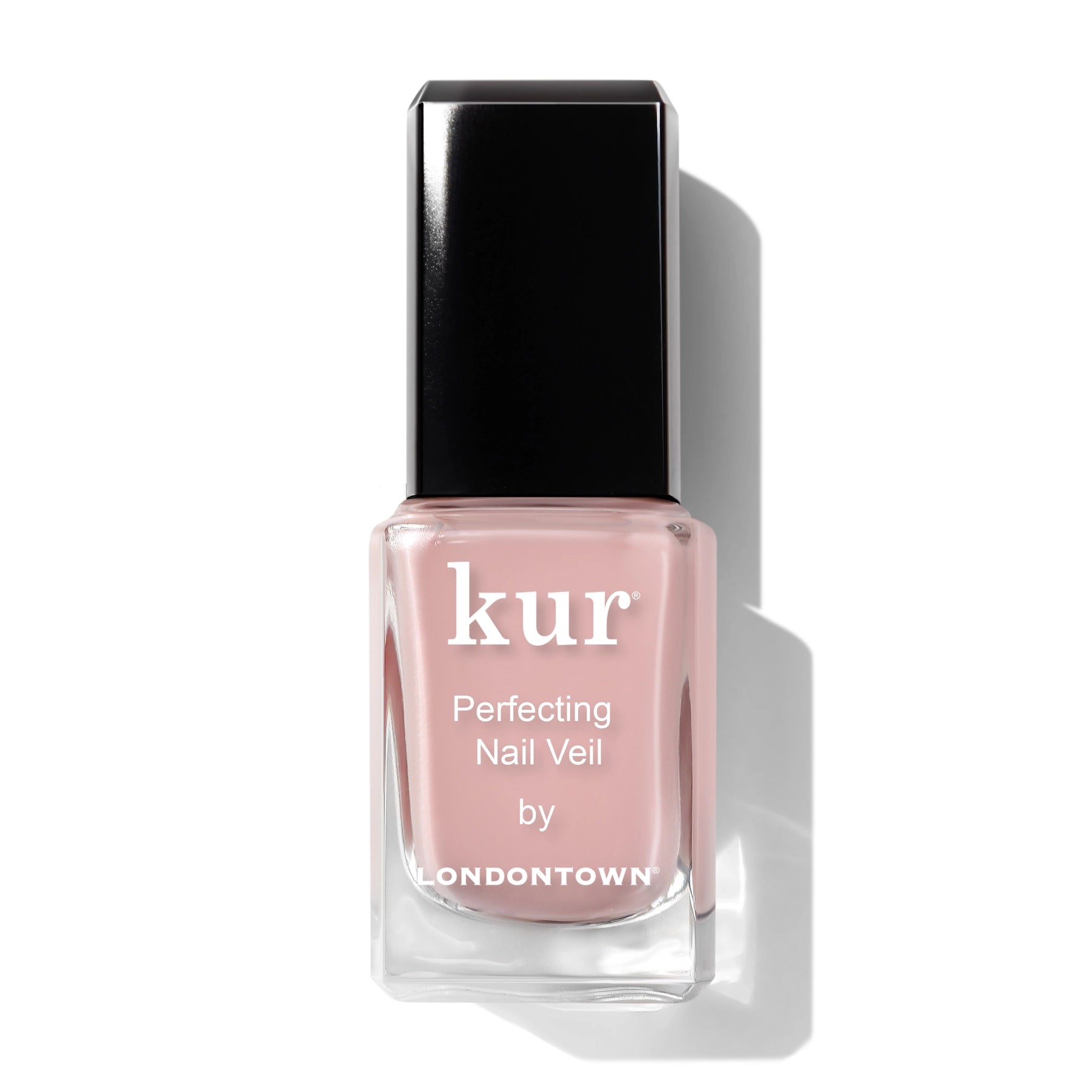 Pink nail polish bottle with black cap on a white background