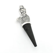 A black and silver mermaid-themed cone-shaped accessory, likely a bottle stopper, featuring a detailed silver mermaid and starfish design on a black conical base, set against a plain white background.