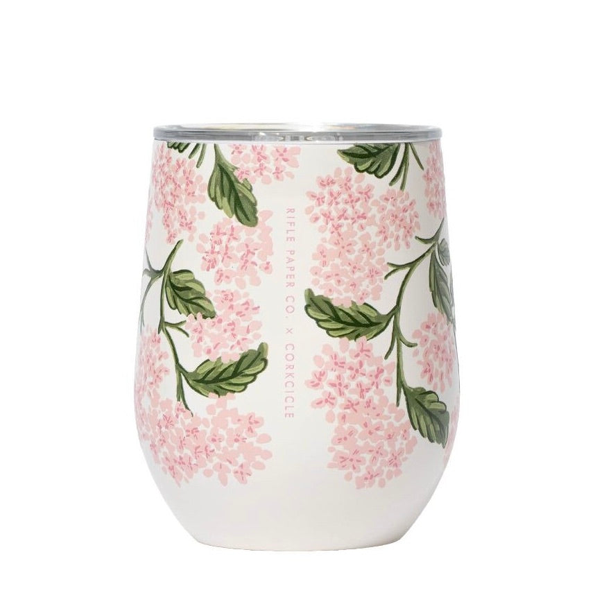 Stemless wine glass with floral design on a white background