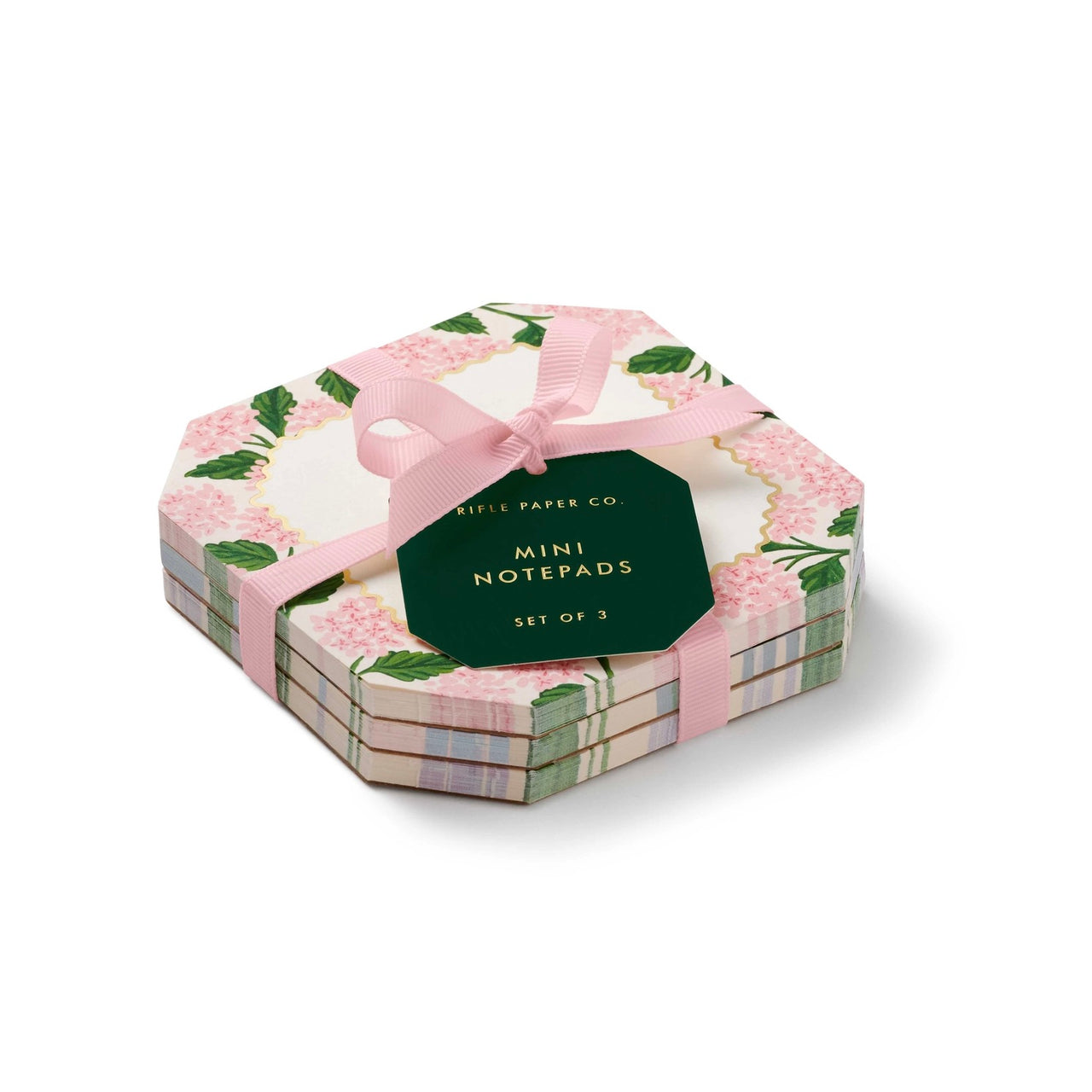 Hexagonal box of mini notepads with floral design and pink ribbon on a white background