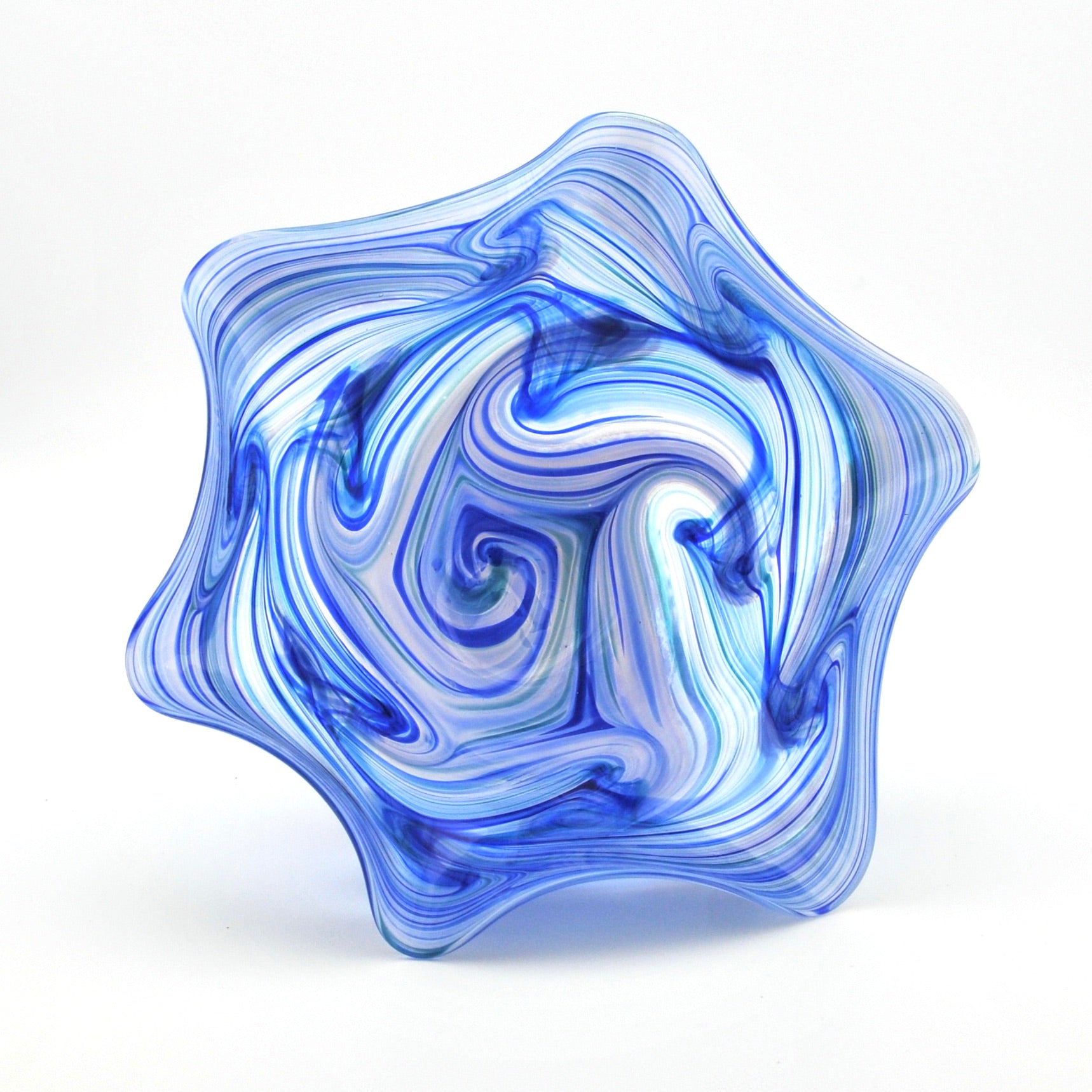 Blue and white glass sculpture on a white background
