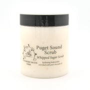 Jar of Puget Sound Scrub whipped sugar scrub with black lid on a white background