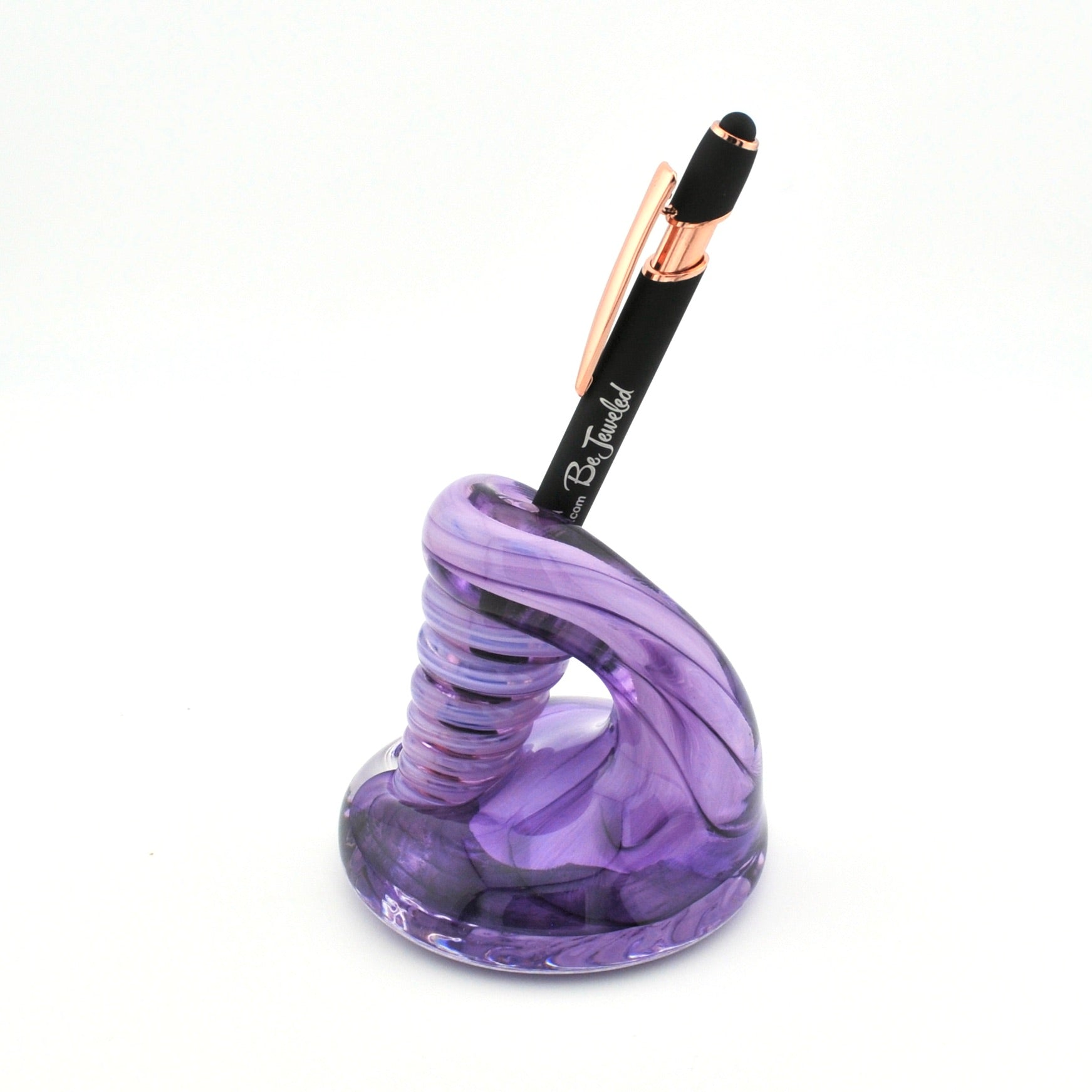 Purple pen holder with a black pen on a white background