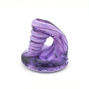 Purple glass sculpture on a white background
