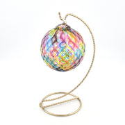 Colorful glass ornament on a white background