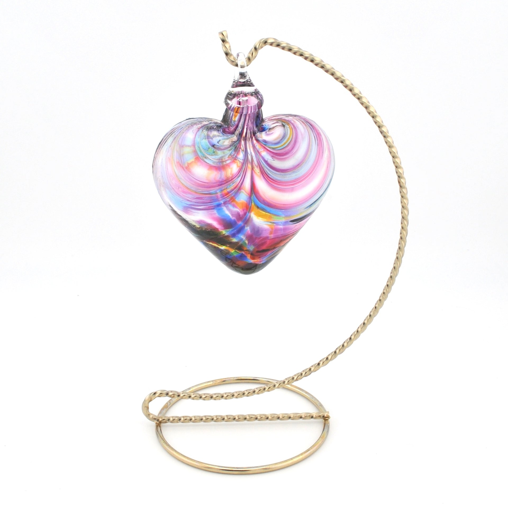 Multicolored glass pendant on a gold chain against a white background