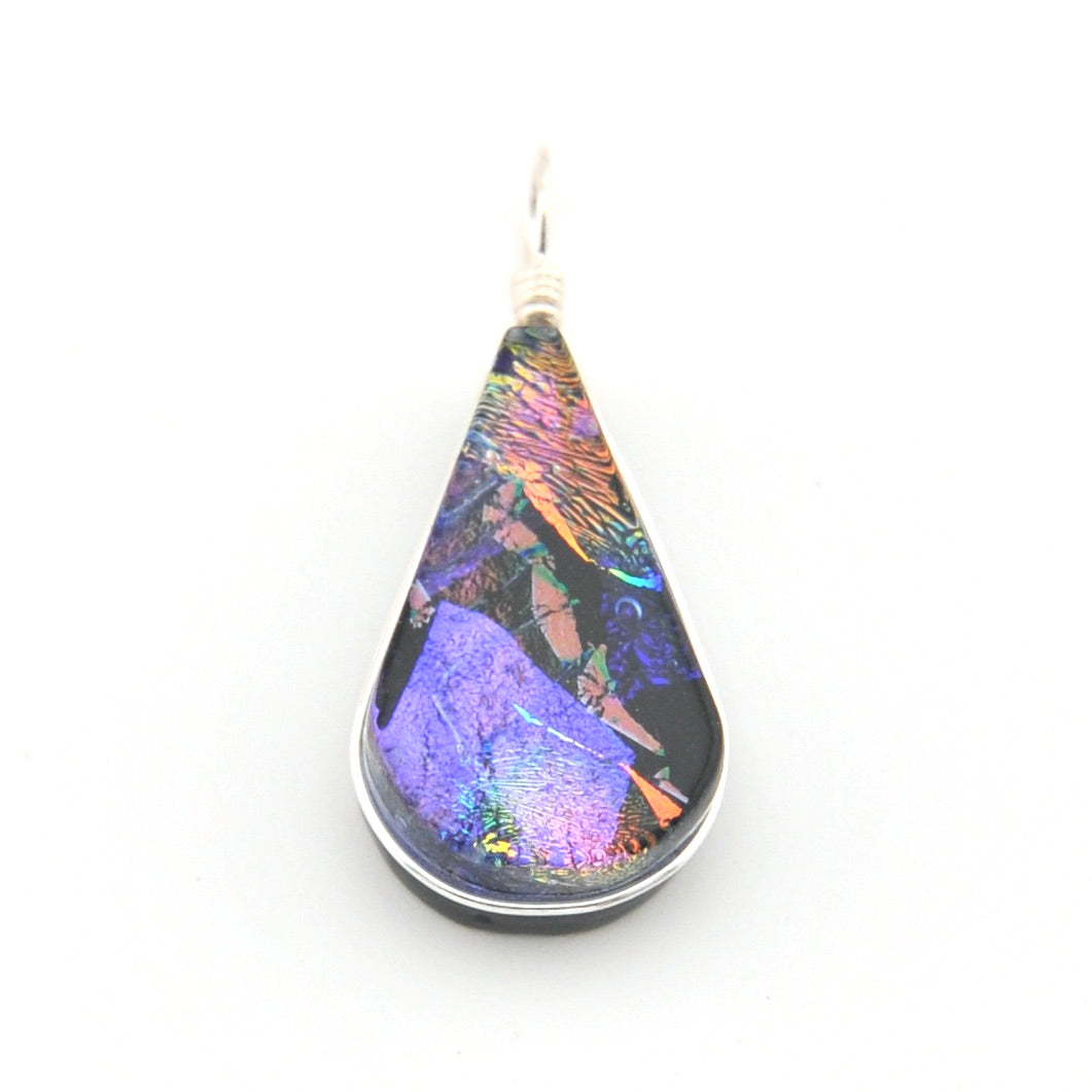 Teardrop-shaped pendant with multicolored pattern on a white background