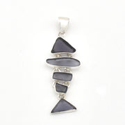 Pendant with blue violet glass on a white background