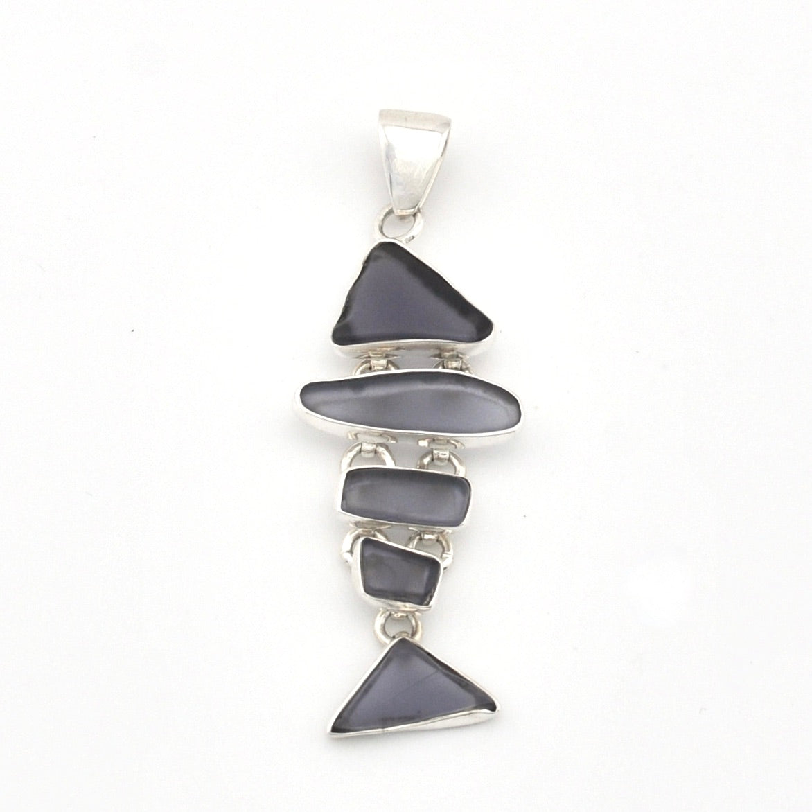 Pendant with blue violet glass on a white background