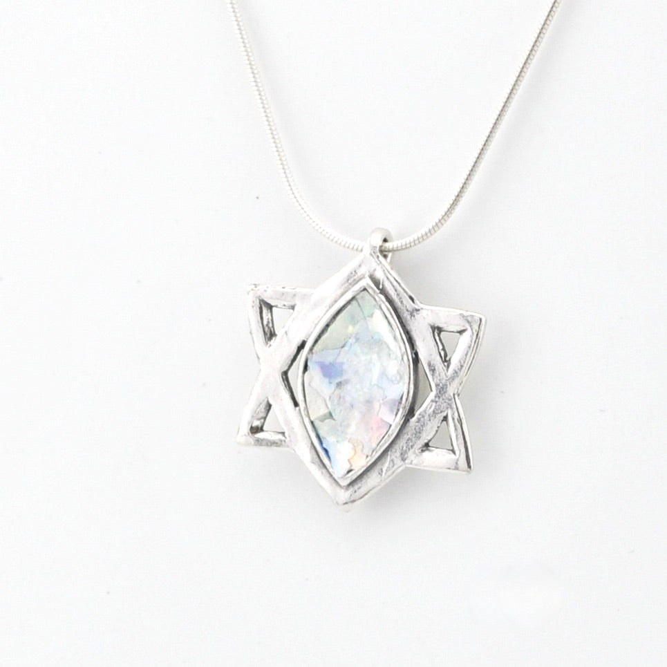 Silver necklace with star of david pendant on a white background