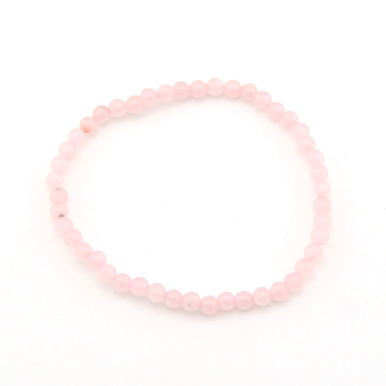 Pink beaded bracelet on a white background