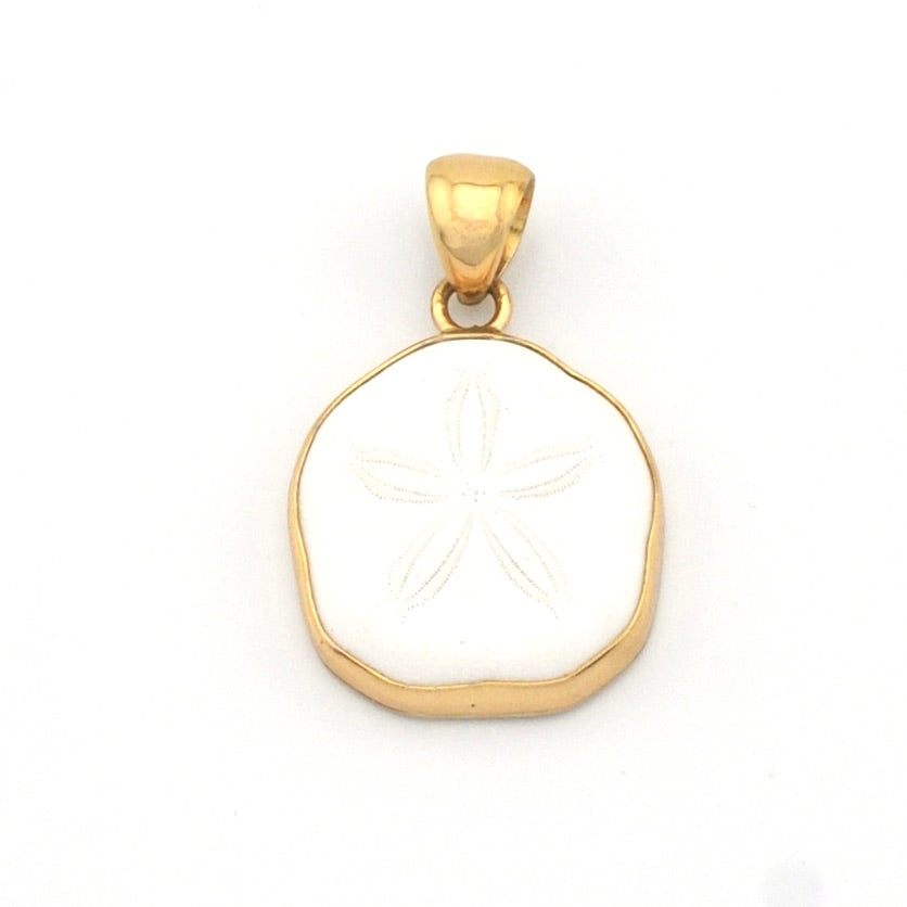 Gold pendant with a white stone on a white background