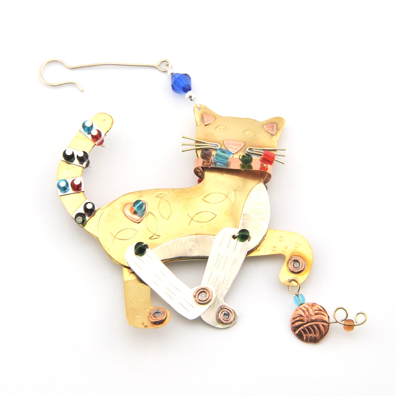Decorative cat-shaped ornament with colorful beads on a white background