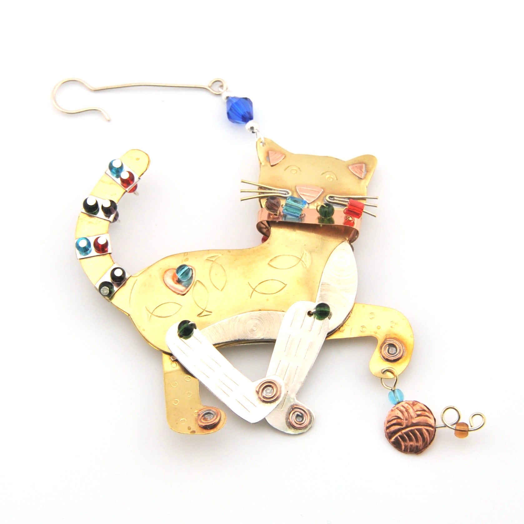 Decorative cat-shaped ornament with colorful beads on a white background
