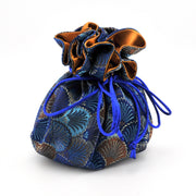 Decorative drawstring bag with blue and brown patterns on a white background