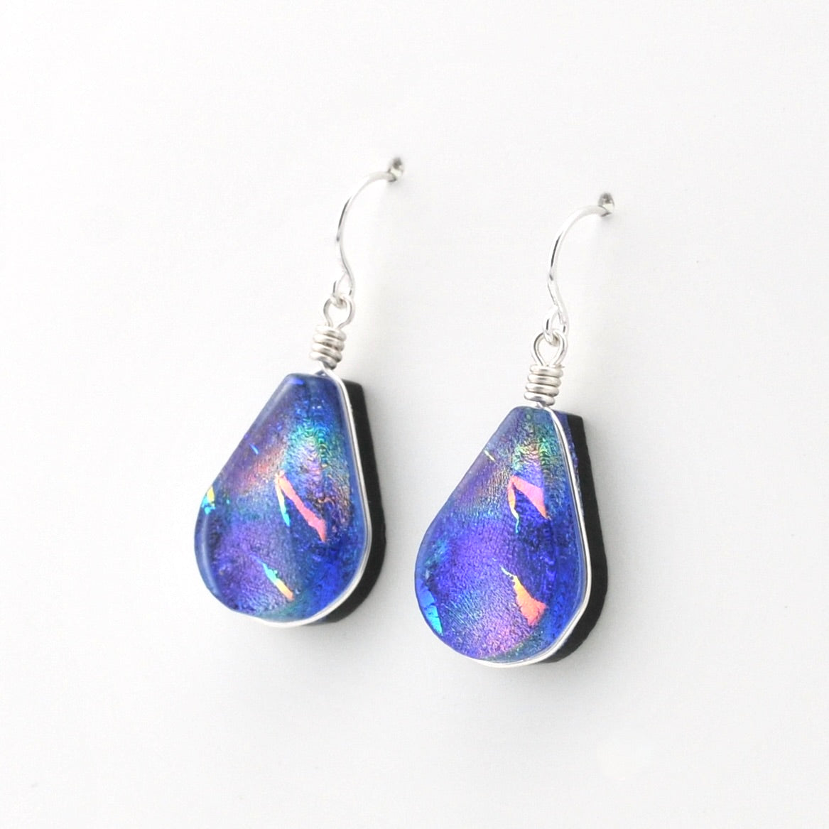 Silver Dichroic Glass Purple Rainbow Lotus Dangle Earrings on white background.