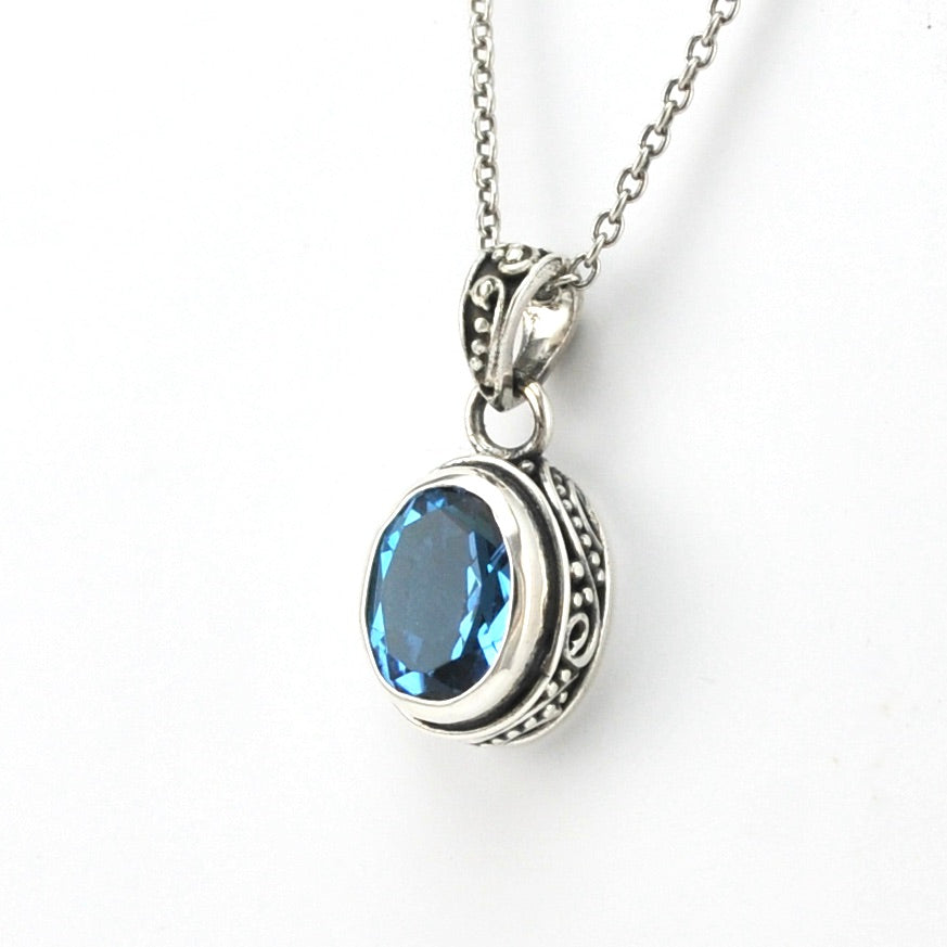 Side Veiw Silver Blue Topaz 6x8mm Oval Bali Necklace