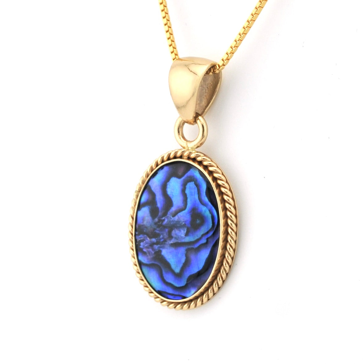 Gold necklace with a blue pendant on a white background