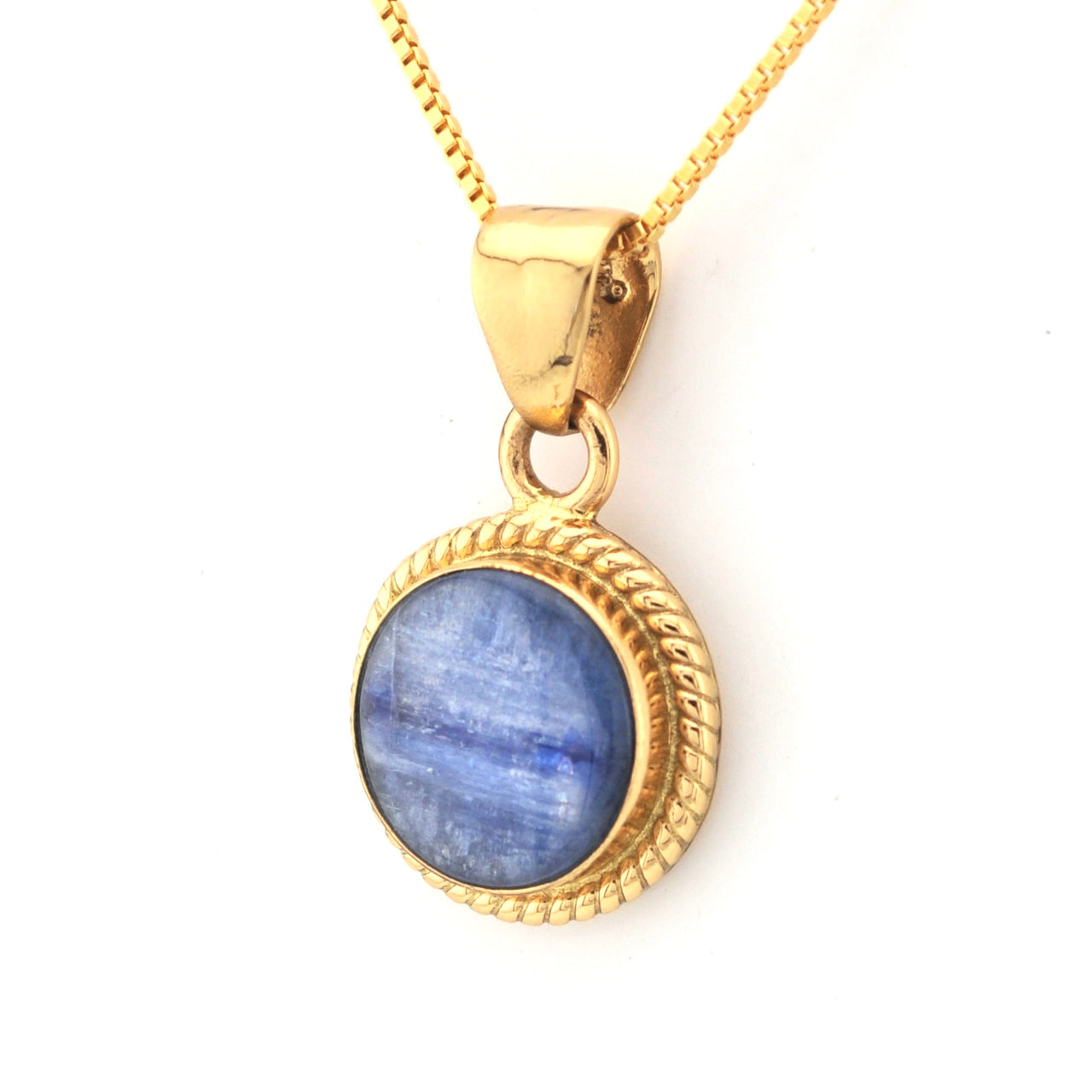 Gold pendant with a blue stone on a white background