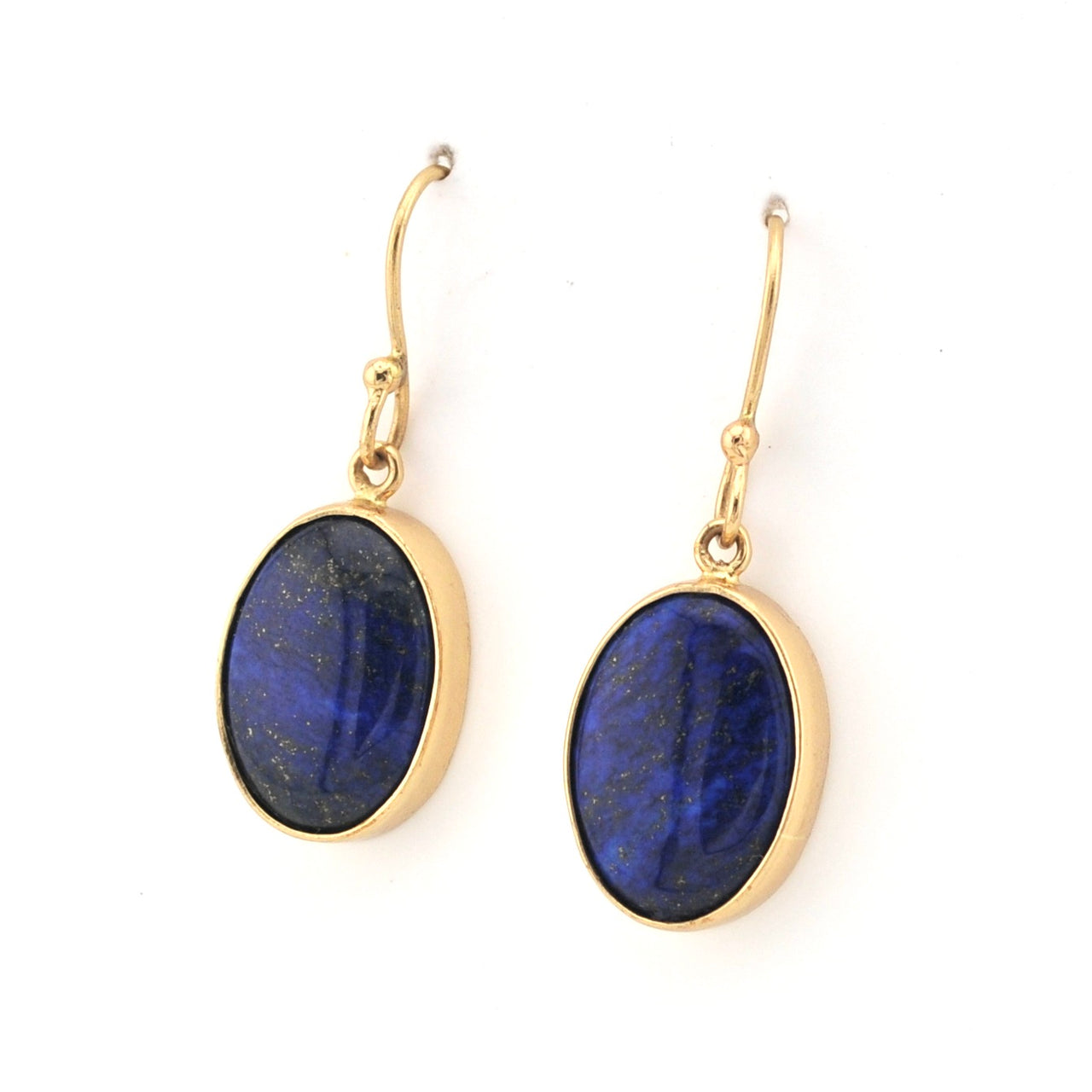 Gold earrings with blue oval stones on a white background