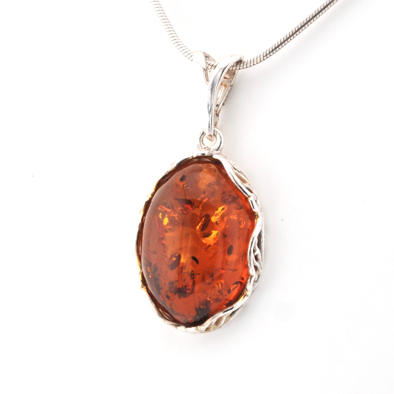 Side View Amber Oval Filigree Bezel Pendant