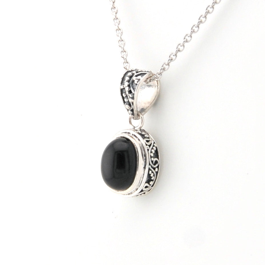 Side View Black Star Diopside 7x9mm Oval Bali Necklace