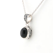 Side View Black Star Diopside 7x9mm Oval Bali Necklace