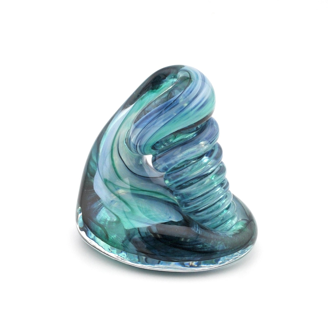 Glass sculpture with blue and green swirls on a white background