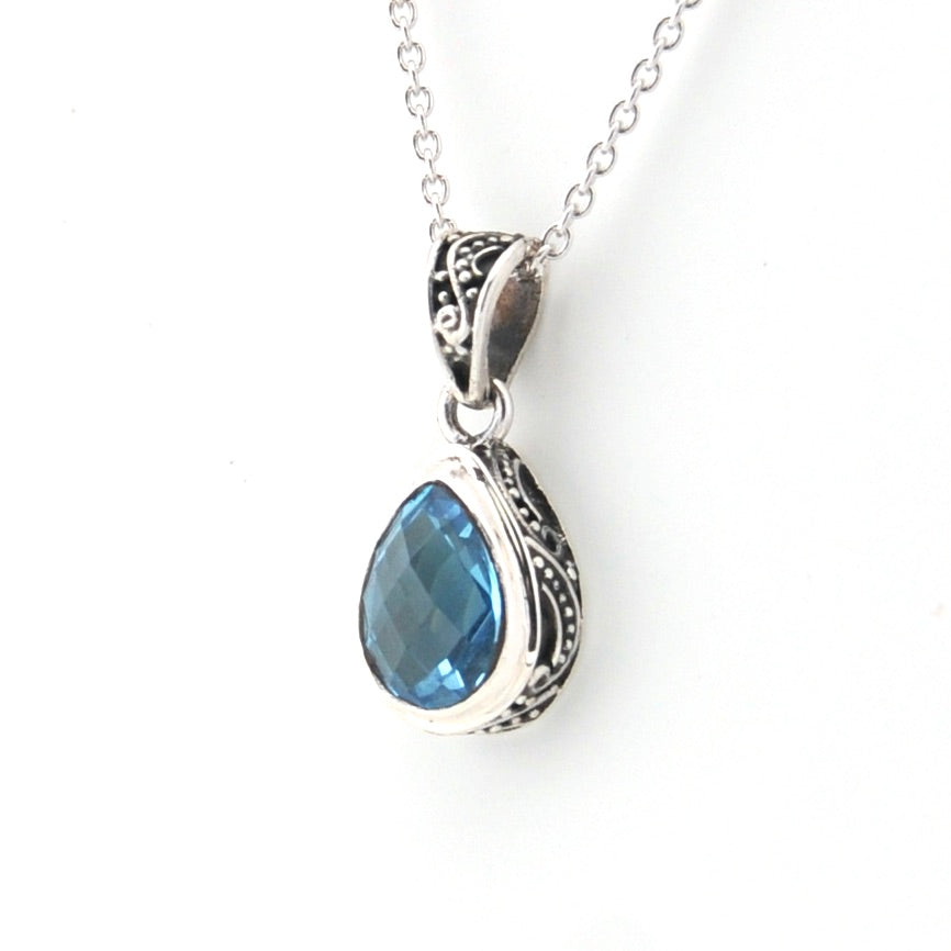Side View Blue Topaz 7x10mm Tear Bali Necklace