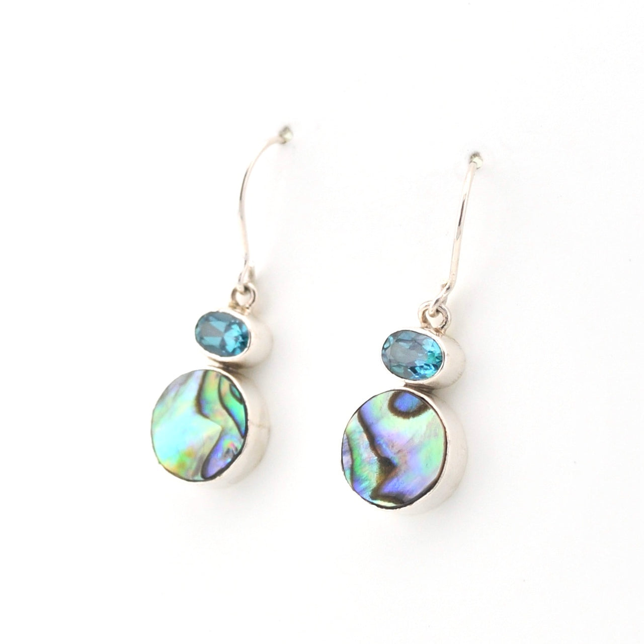 Pair of earrings with colorful gemstones on a white background