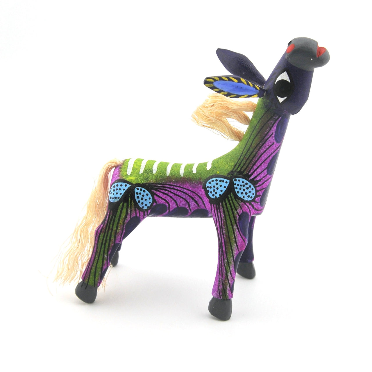 Colorful burro-like creature with a long tail on a white background