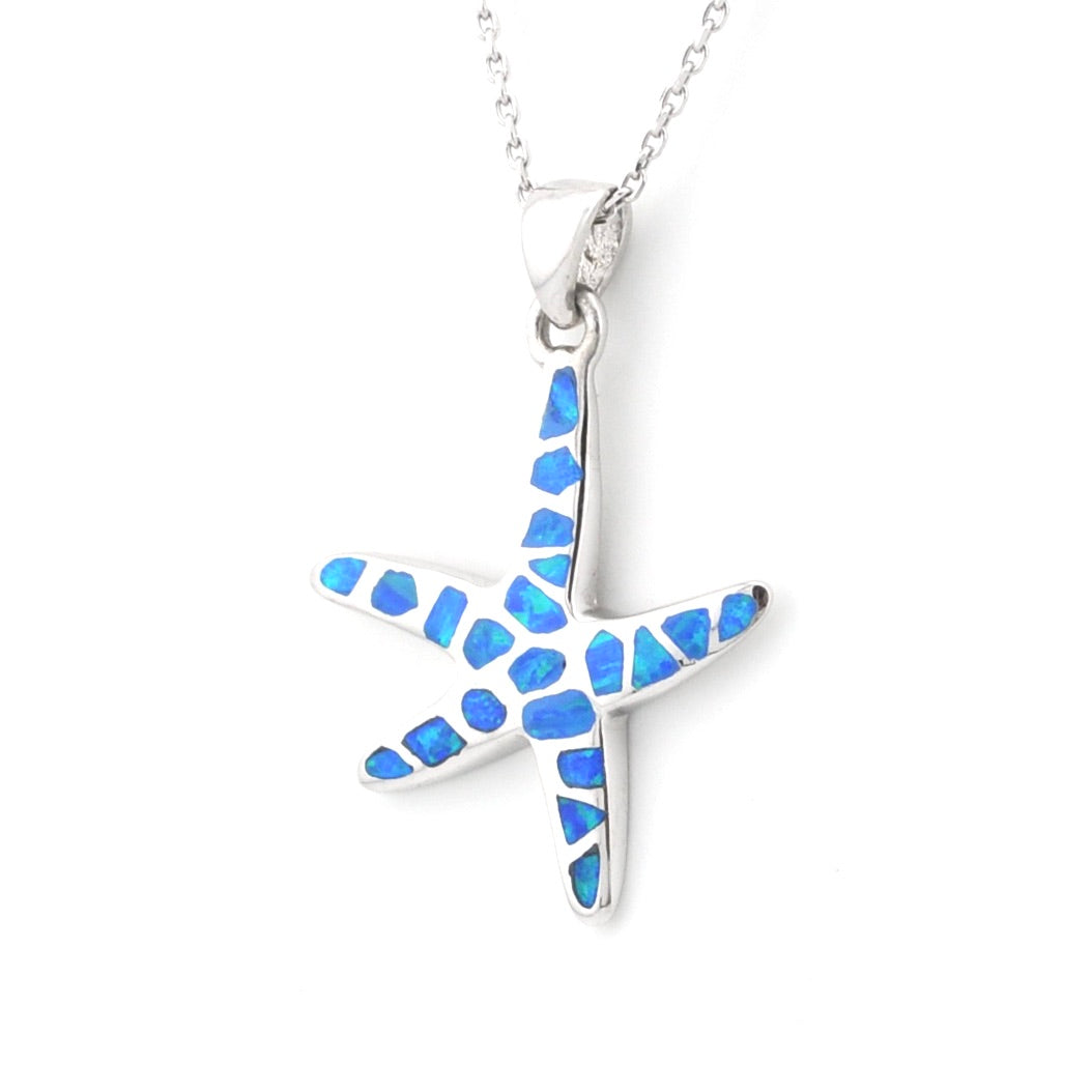 Starfish-shaped pendant with blue inlay on a white background