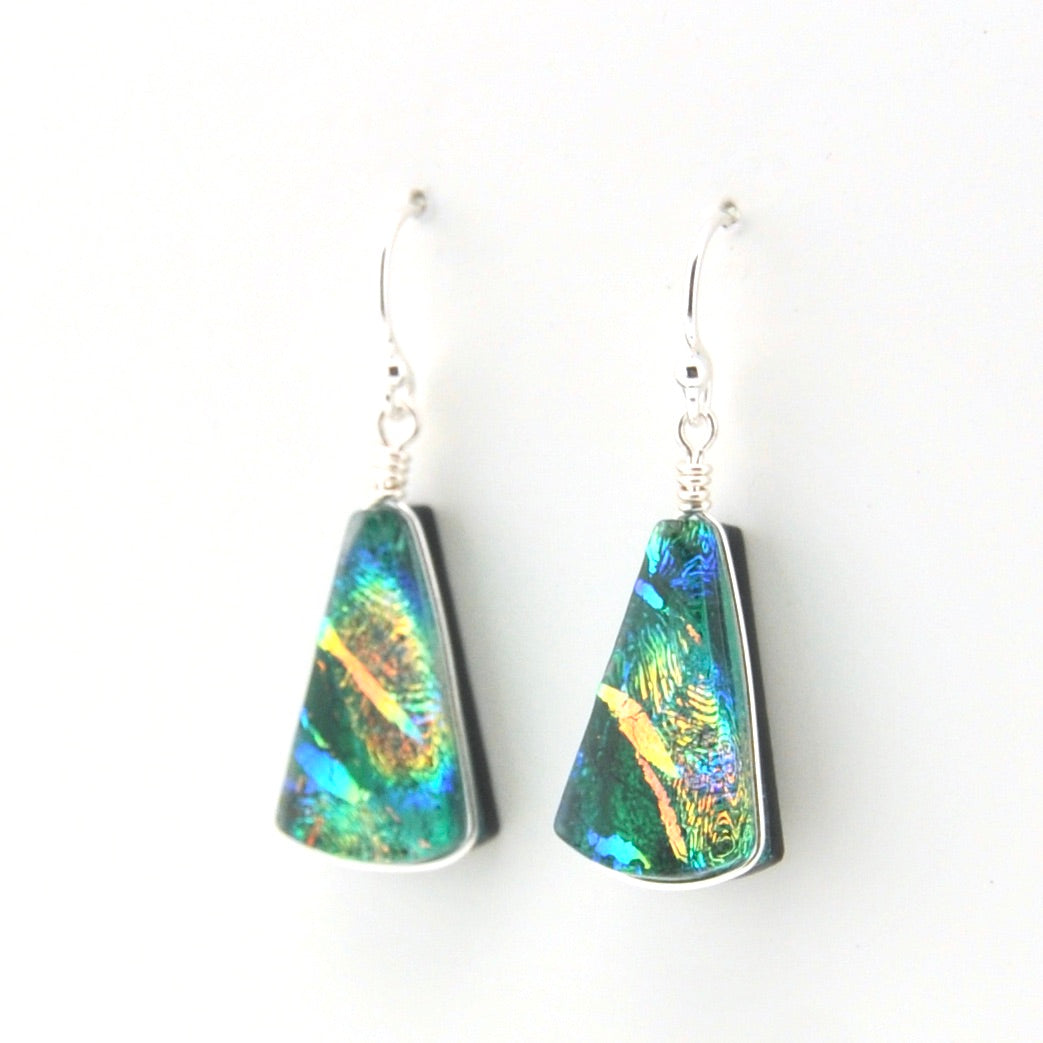 Colorful triangular earrings on a white background