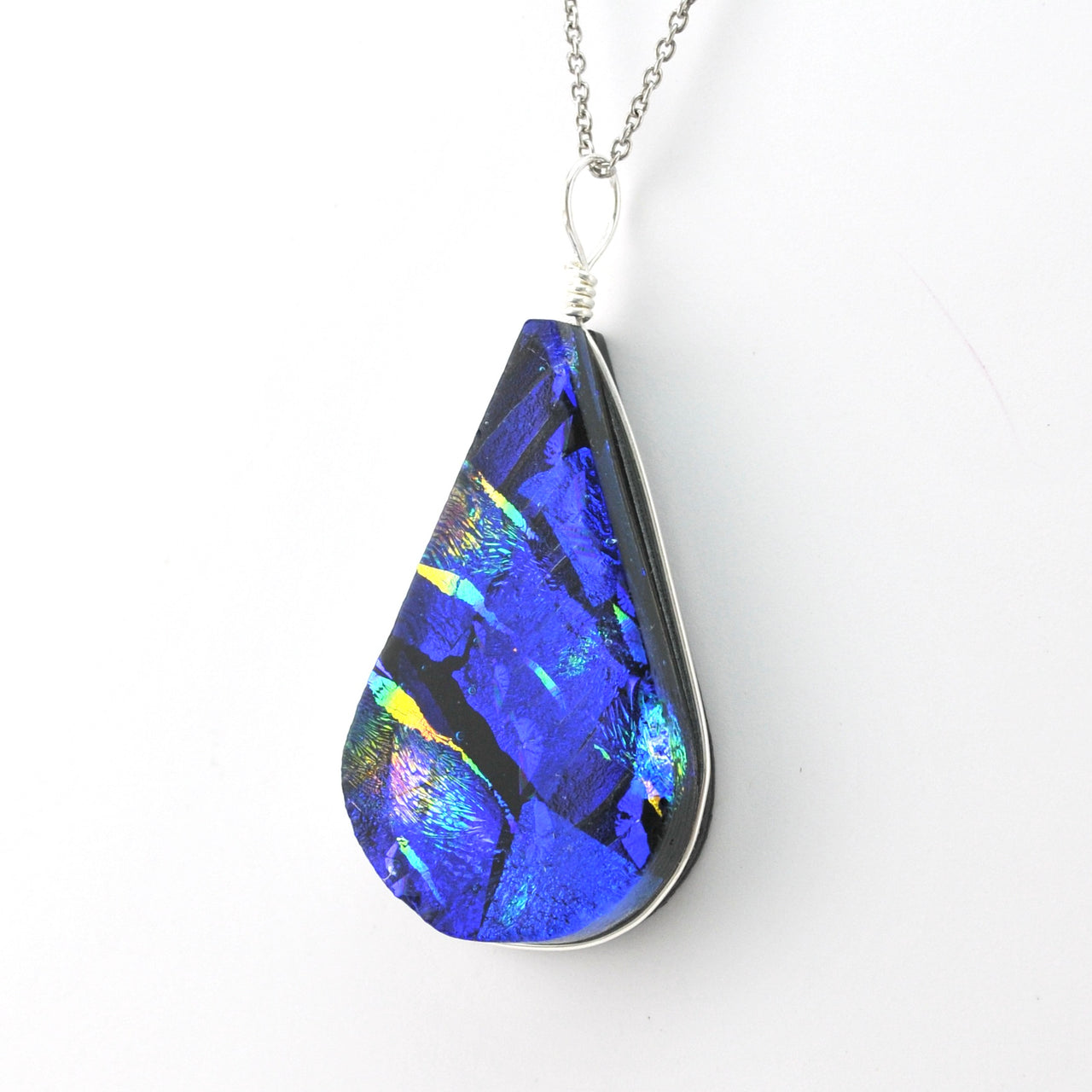 Side View Dichroic Glass Rainbow Blue Teardrop Pendant