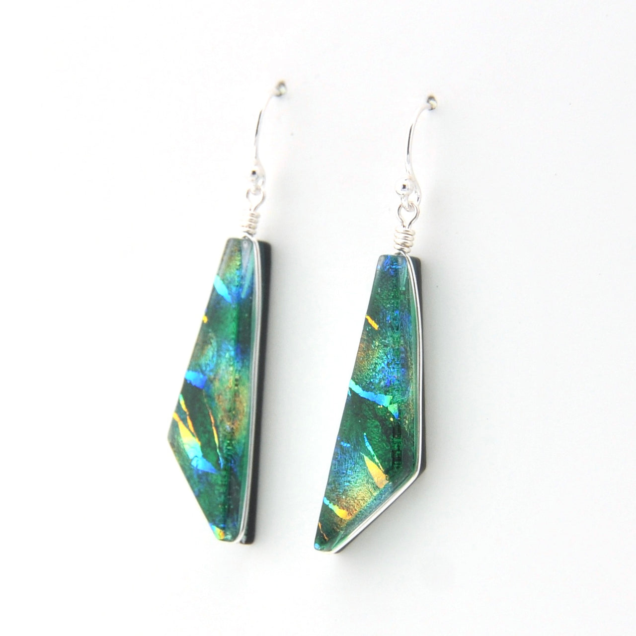 Colorful geometric earrings on a white background