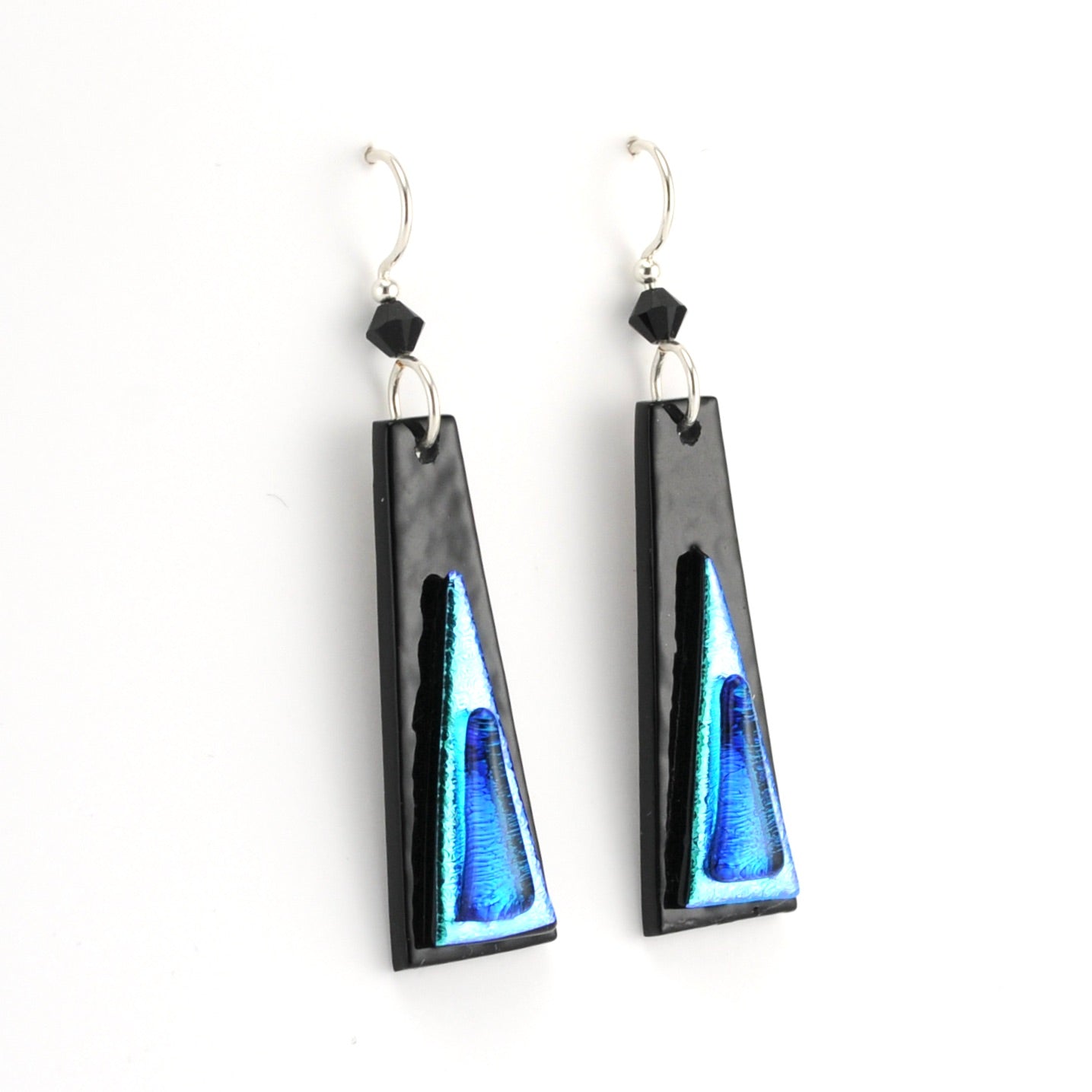 Black and blue earrings on a white background