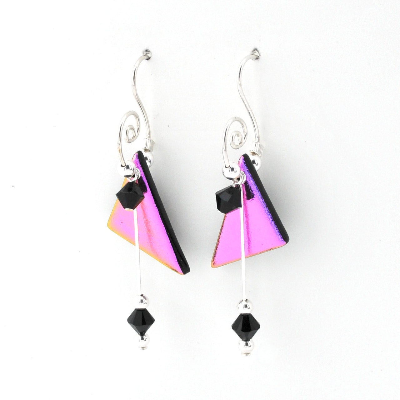 A pair of silver dangle earrings featuring triangular glass panels with a pink and purple iridescent finish, accented with small black faceted beads, shown on a plain white background.