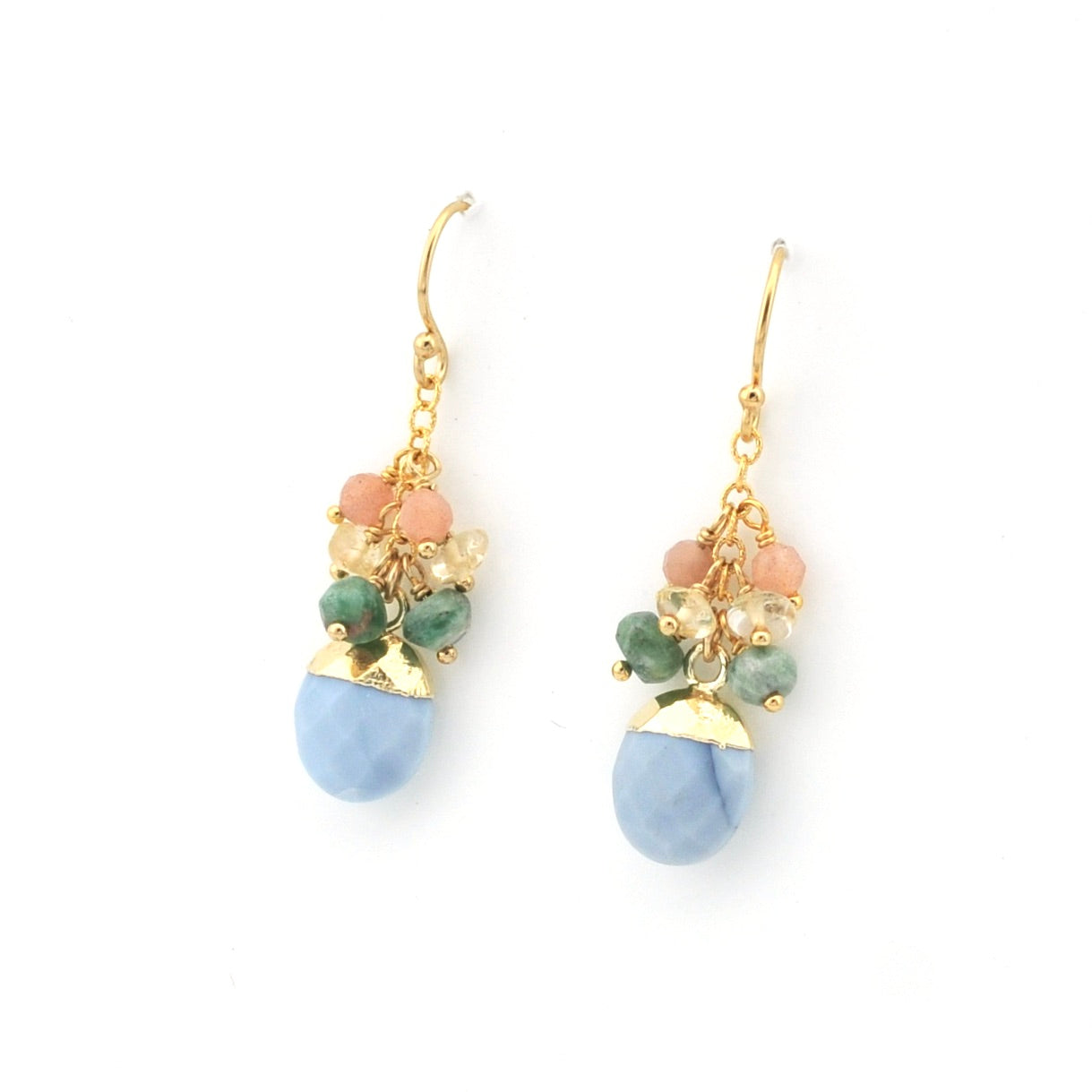 Pair of earrings with blue, green, and pink beads on gold hooks against a white background